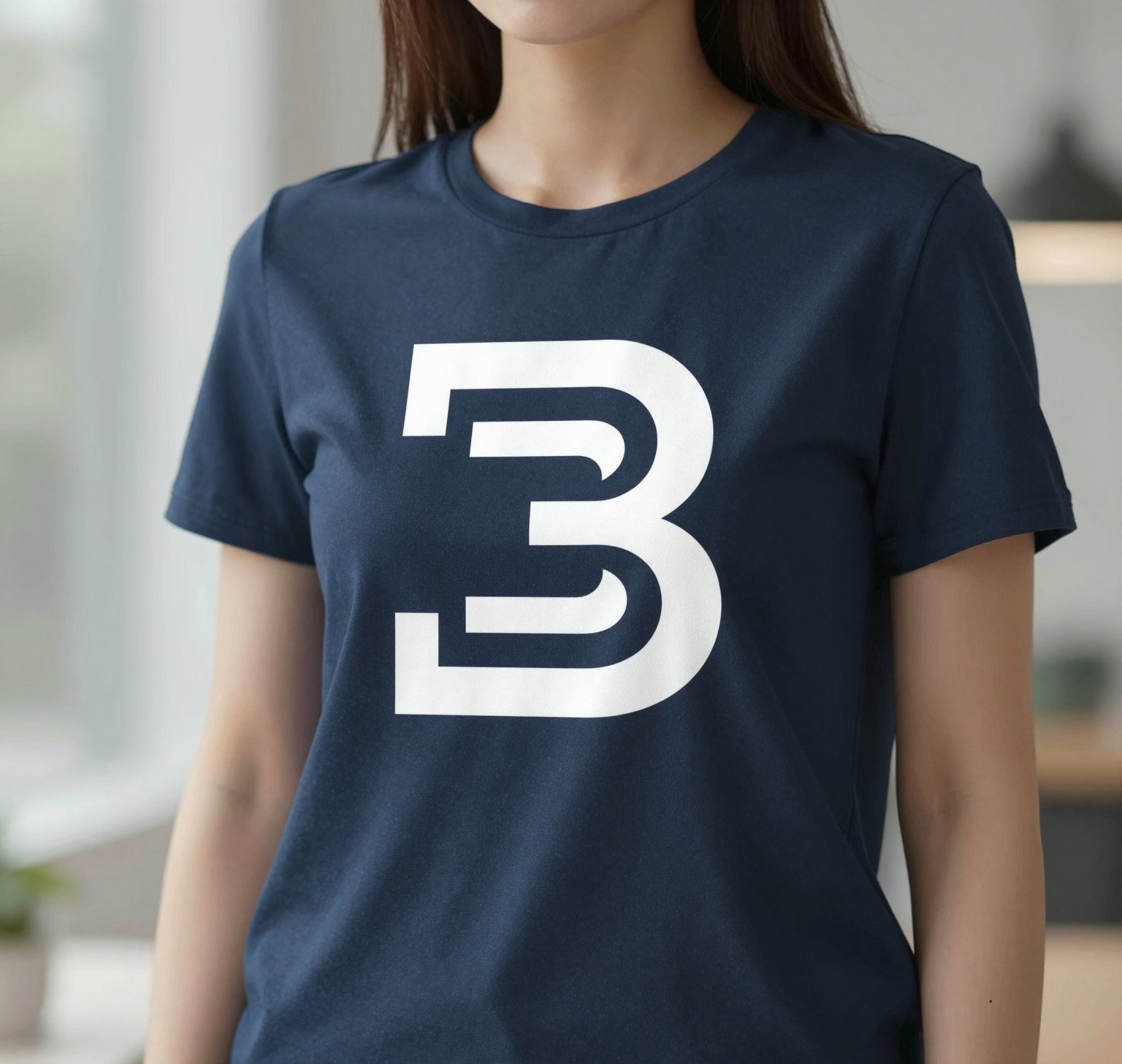 Navy T-shirt printed with a bold white logo mark