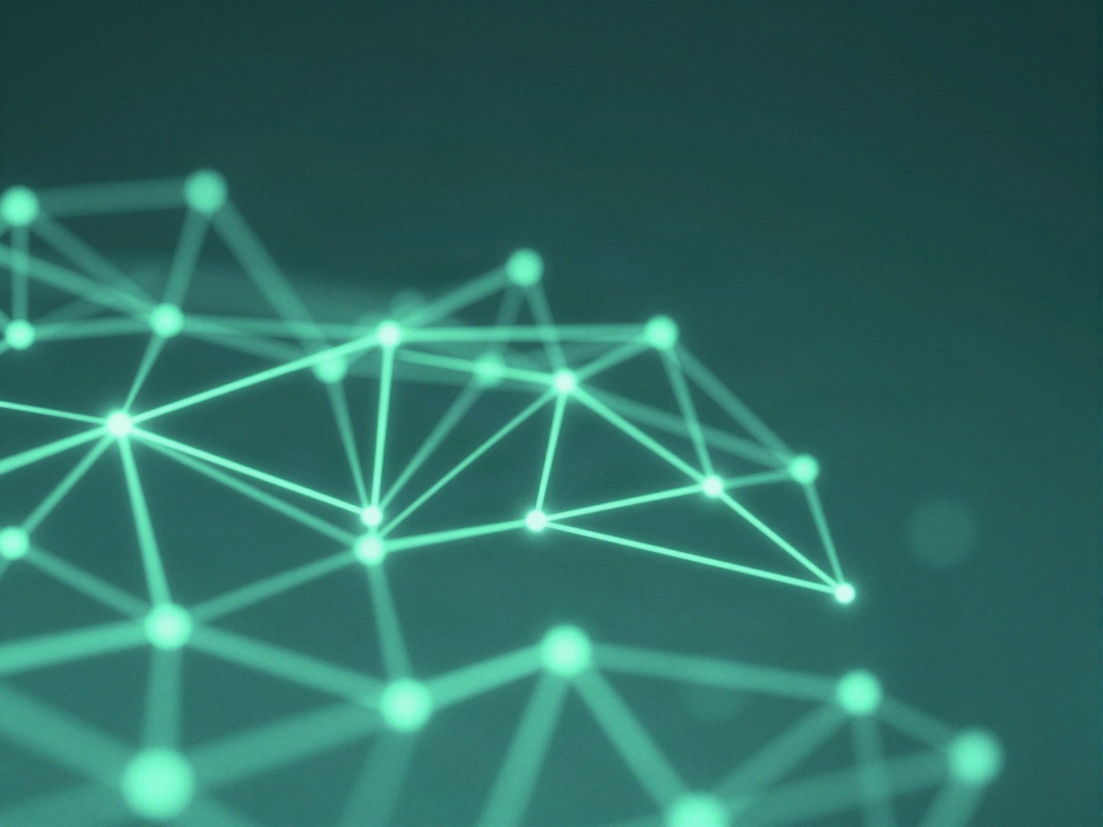 A glowing green network of connected nodes