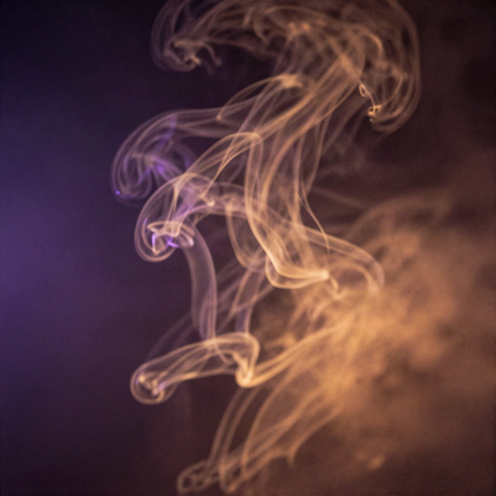 Album artwork of amber and violet smoke swirling in darkness