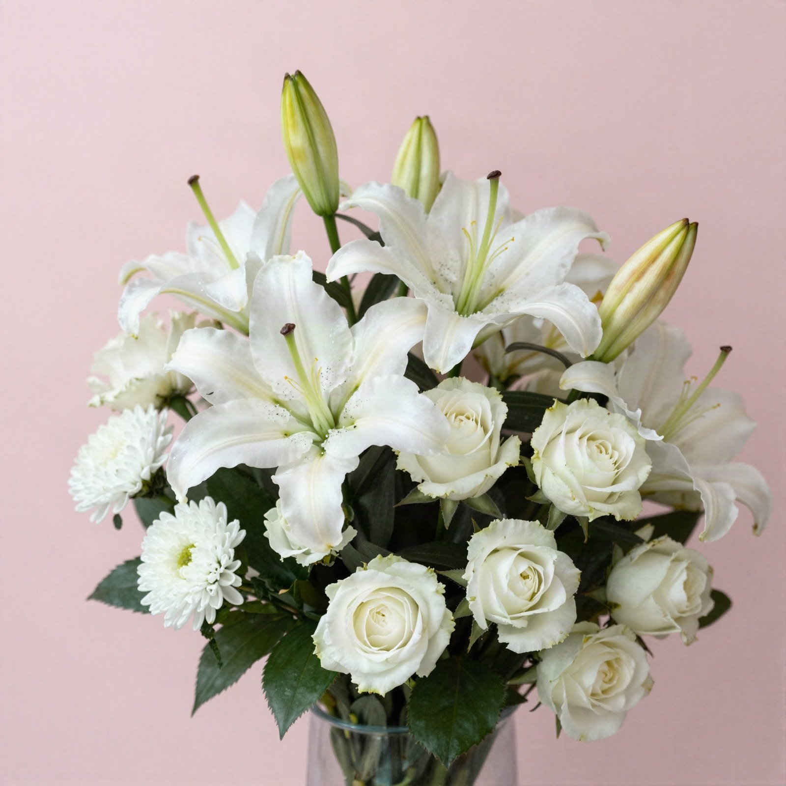 A bouquet of white lilies, roses and chrysanthemums