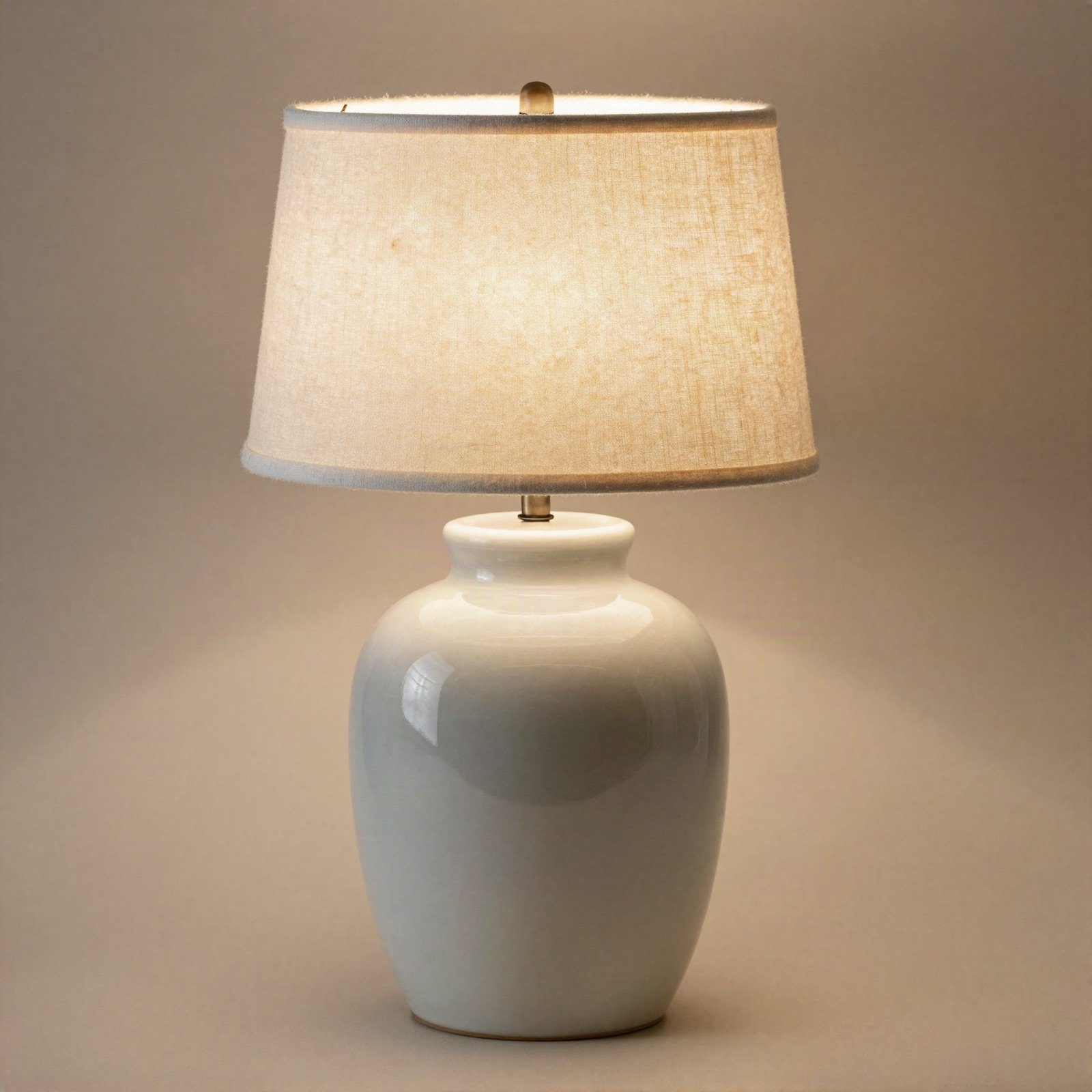 Ceramic table lamp with a linen drum shade