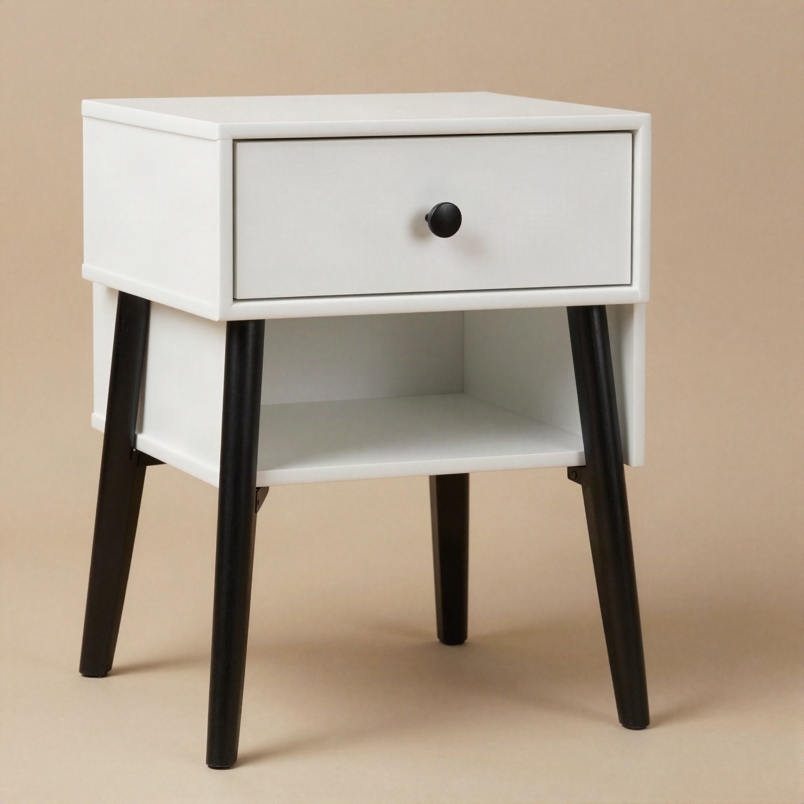 Matte white nightstand with a drawer, open shelf and black legs