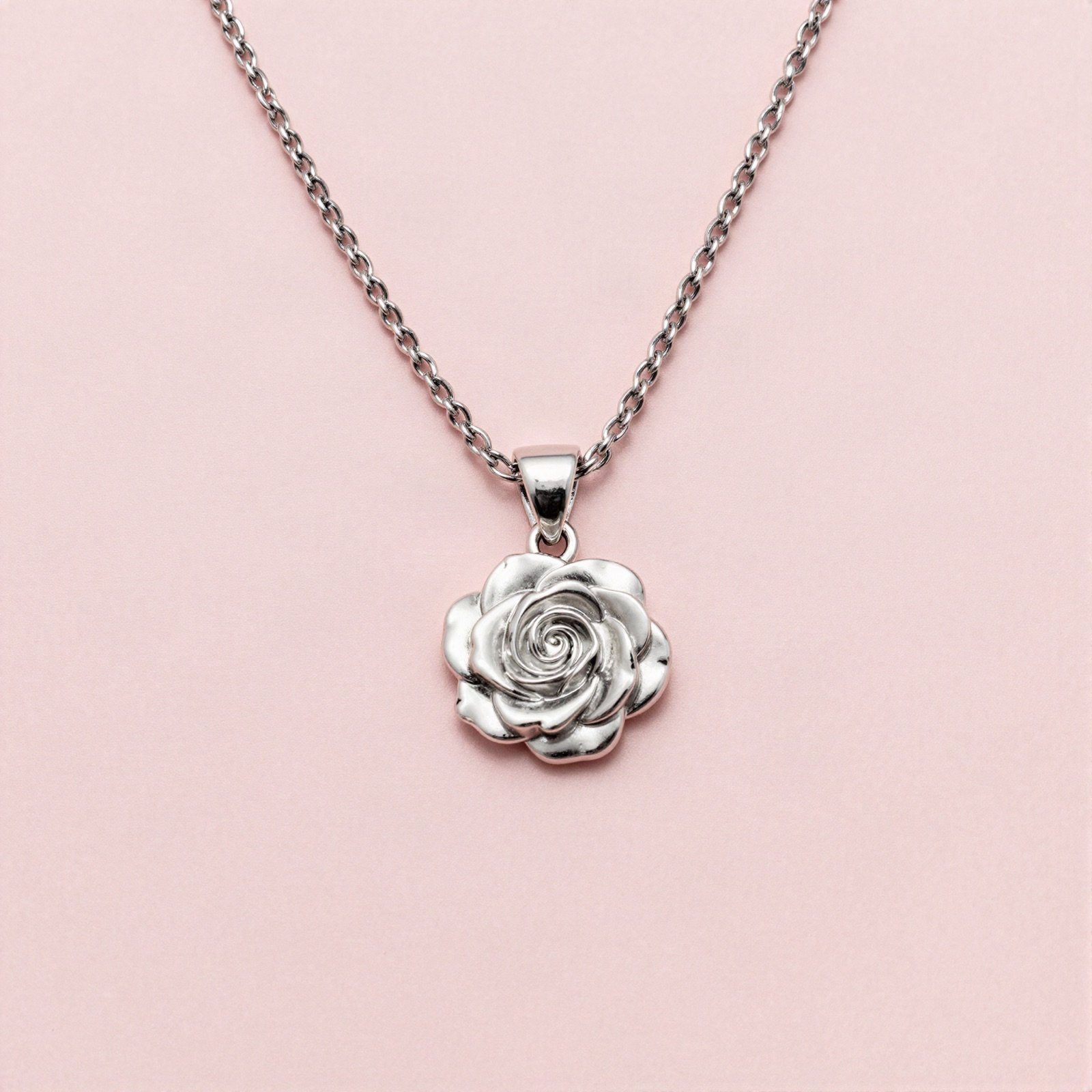 Silver necklace with a rose pendant