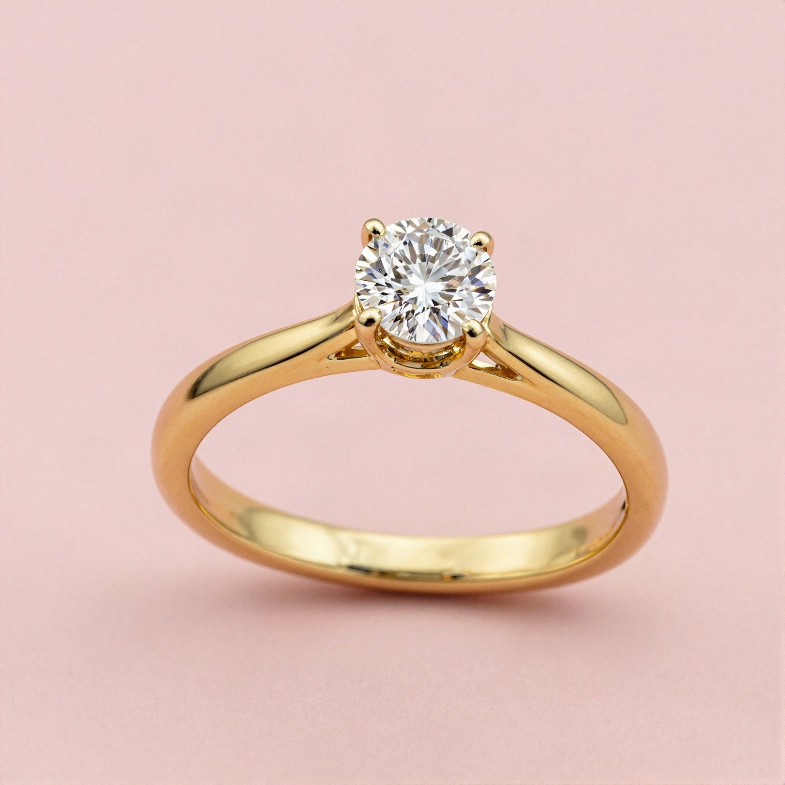 Yellow gold diamond solitaire ring
