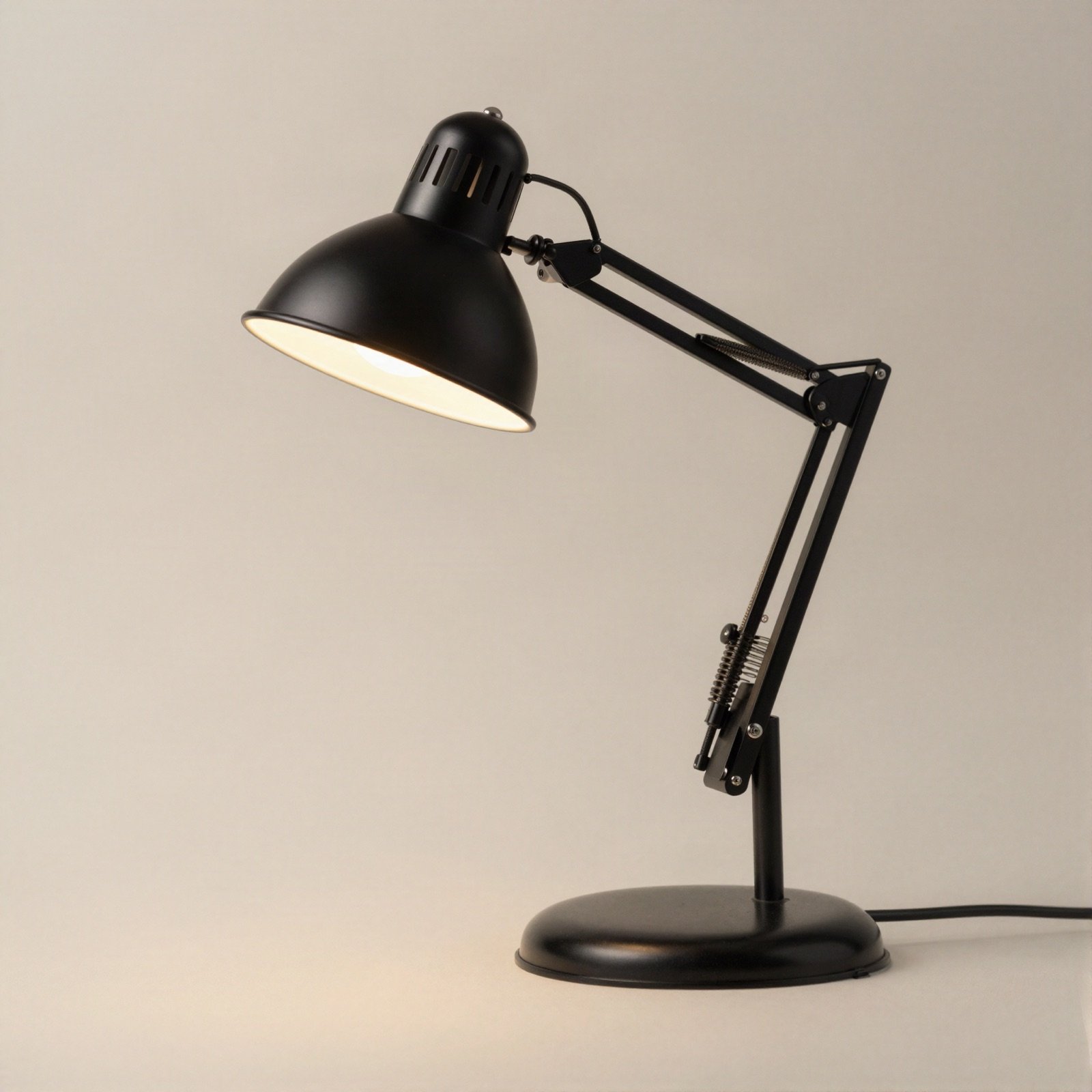 Black metal desk lamp with an adjustable arm