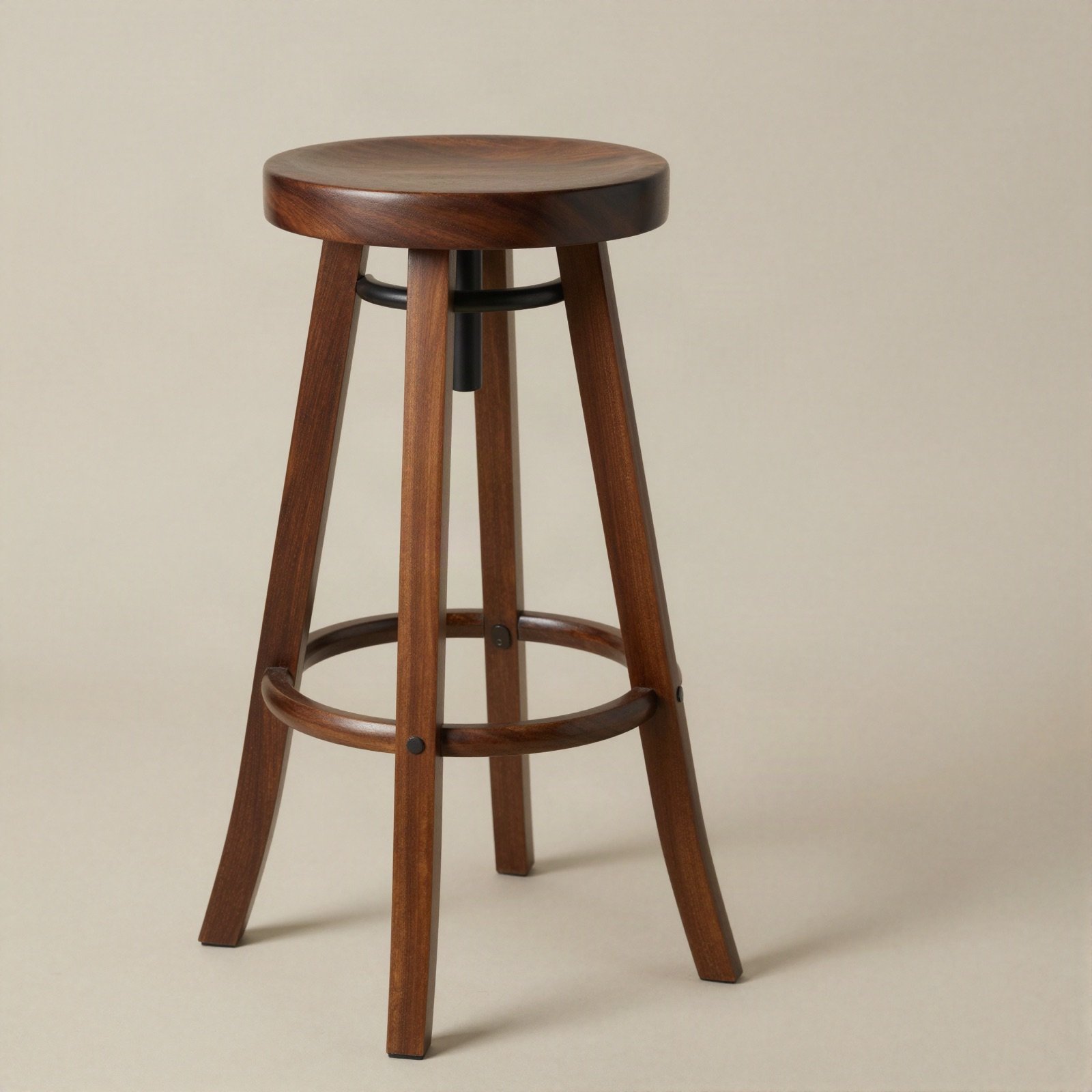 Round brown wooden stool with a footrest ring