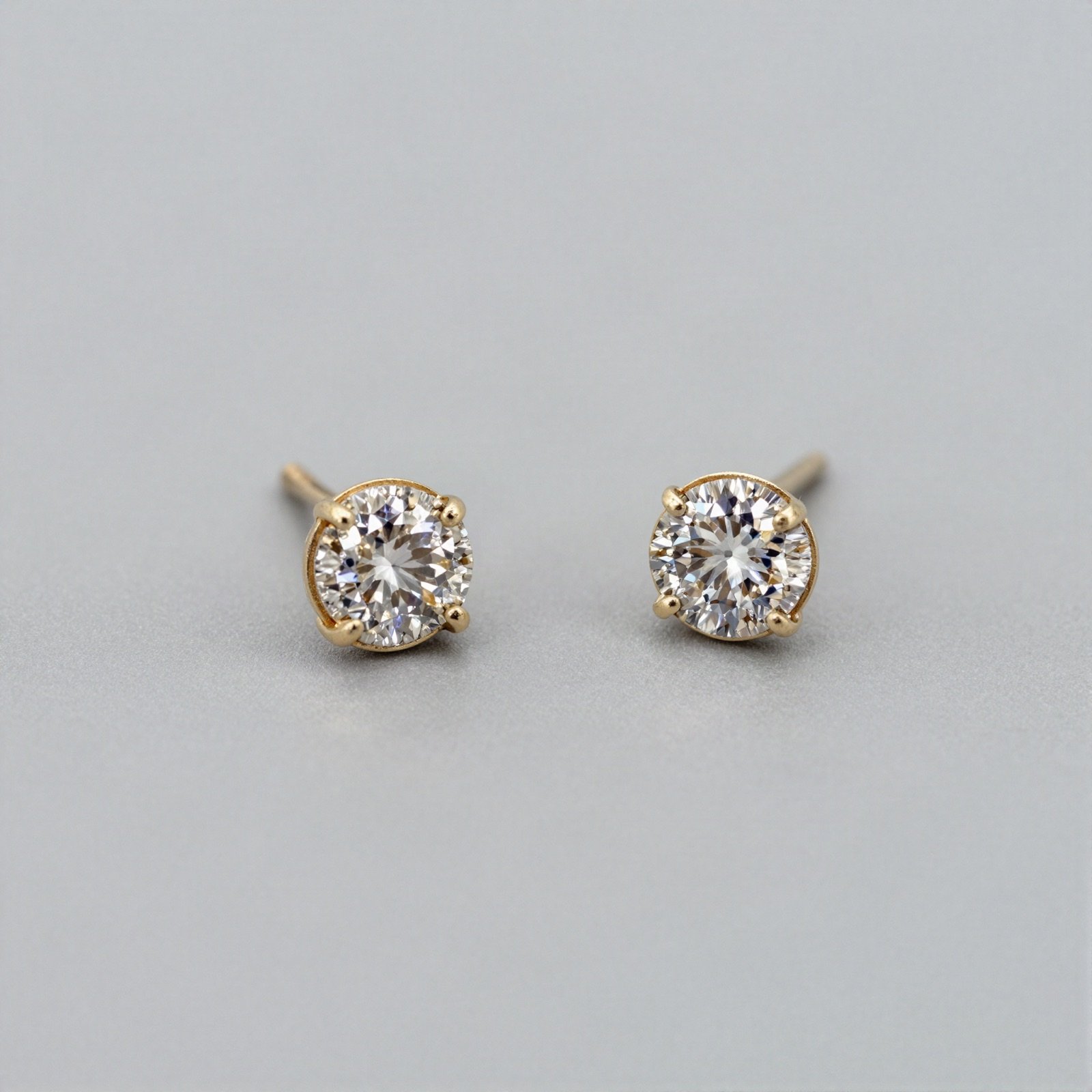 Pair of gold diamond stud earrings