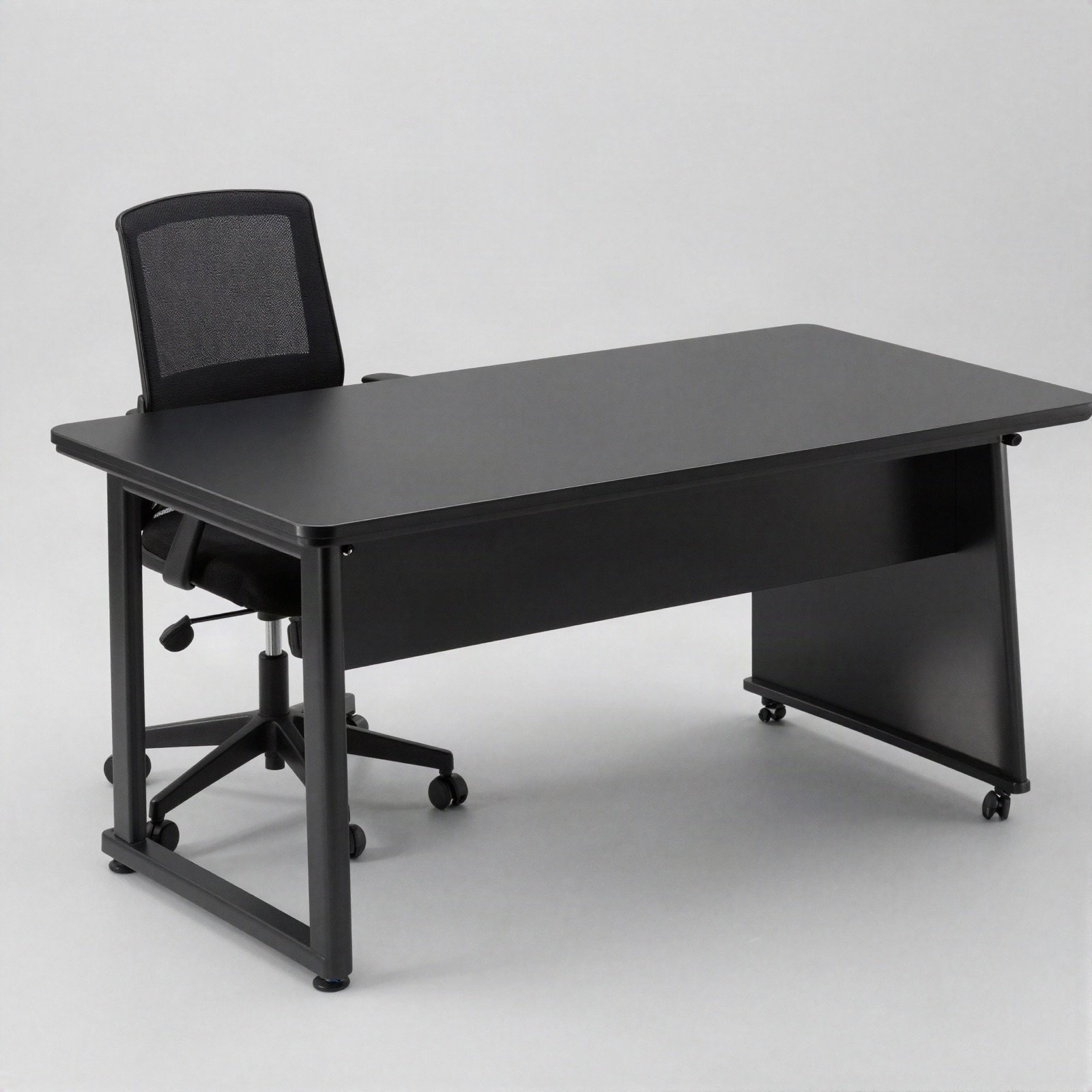 A black desk and office chair set