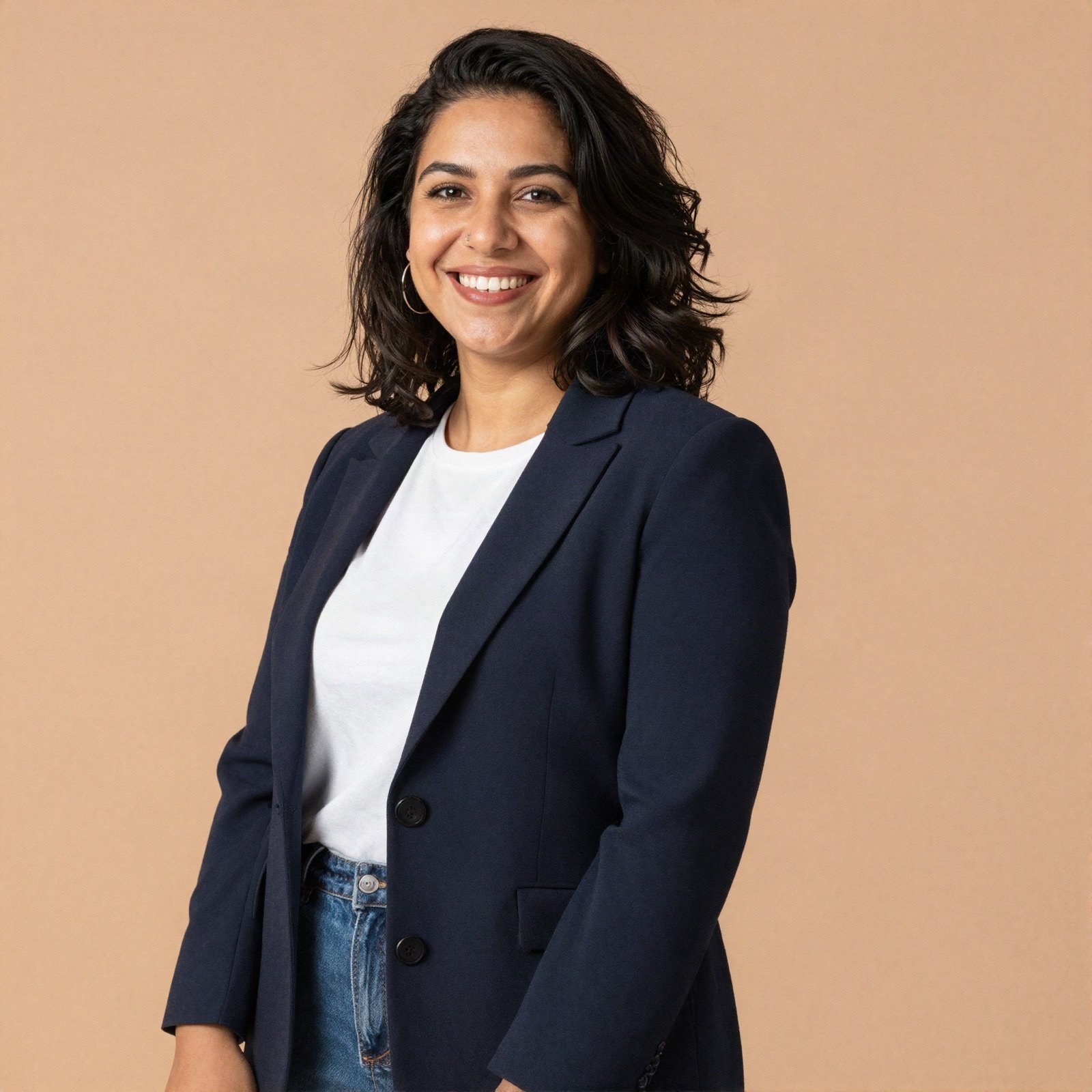 Portrait of a smiling woman in a navy blazer